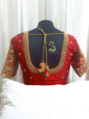 bridal blouse back neck design with bride groom initials tassels aari embroidery blouse