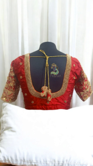 bridal blouse back neck design with bride groom initials tassels aari embroidery blouse