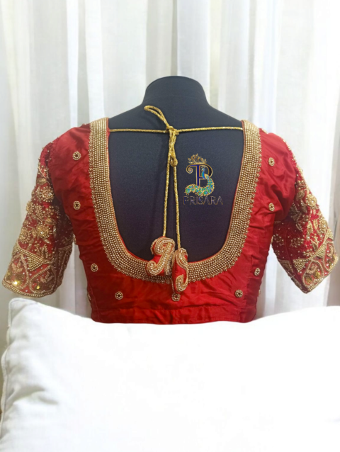 bridal blouse back neck design with bride groom initials tassels aari embroidery blouse