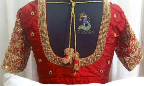 bridal blouse back neck design with bride groom initials tassels aari embroidery blouse